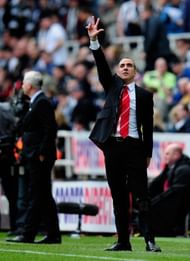 Sunderland manager Paolo Di Canio holds up 3 fingers after the third Sunderland goal during the Barclays Premier League match between Newcastle United and Sunderland at St James' Park on April 14, 2013 in Newcastle upon Tyne, England. (Photo by Stu Forster/Getty Images)